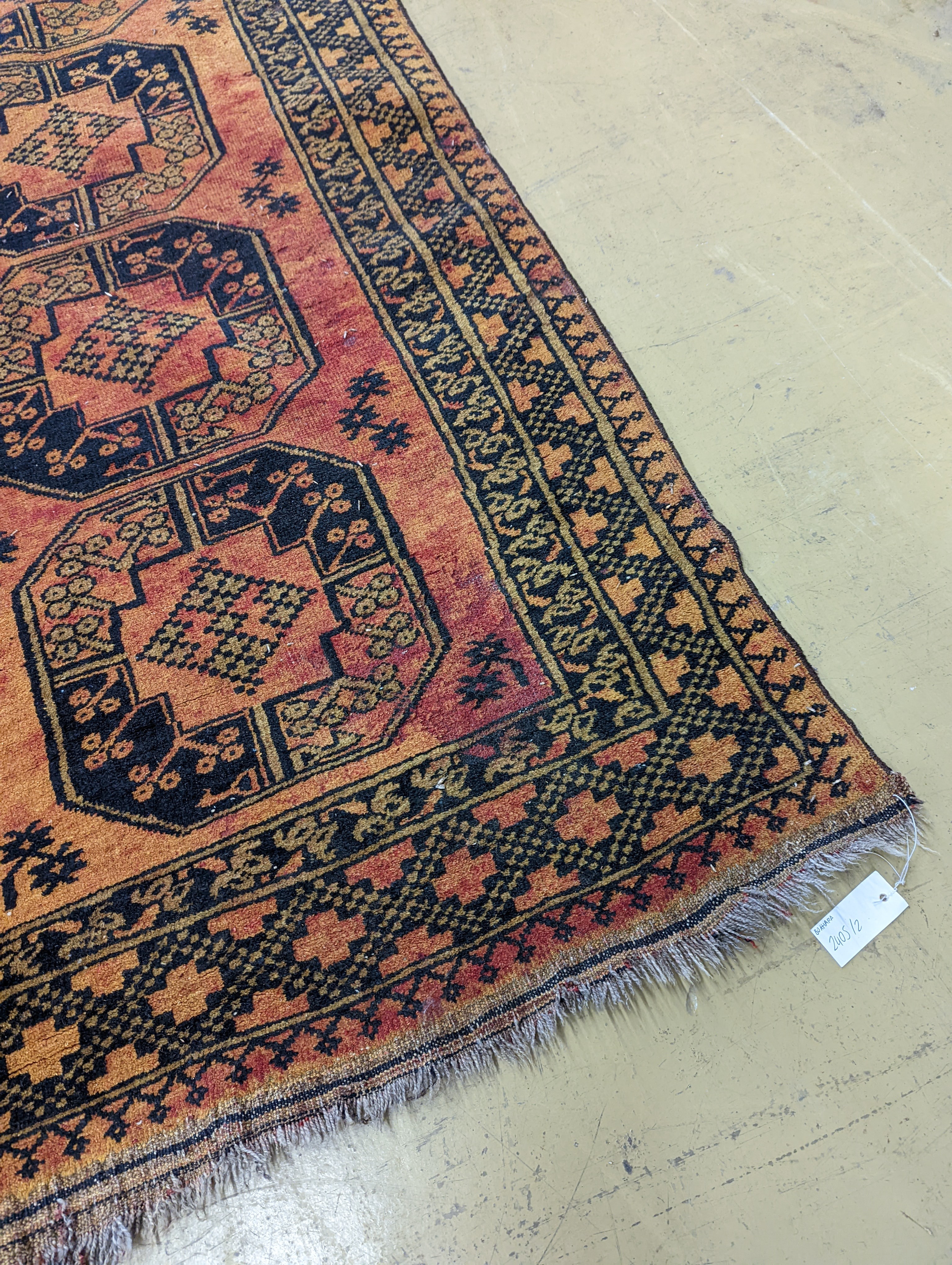 An Afghan geometric runner, 300 x 86cm